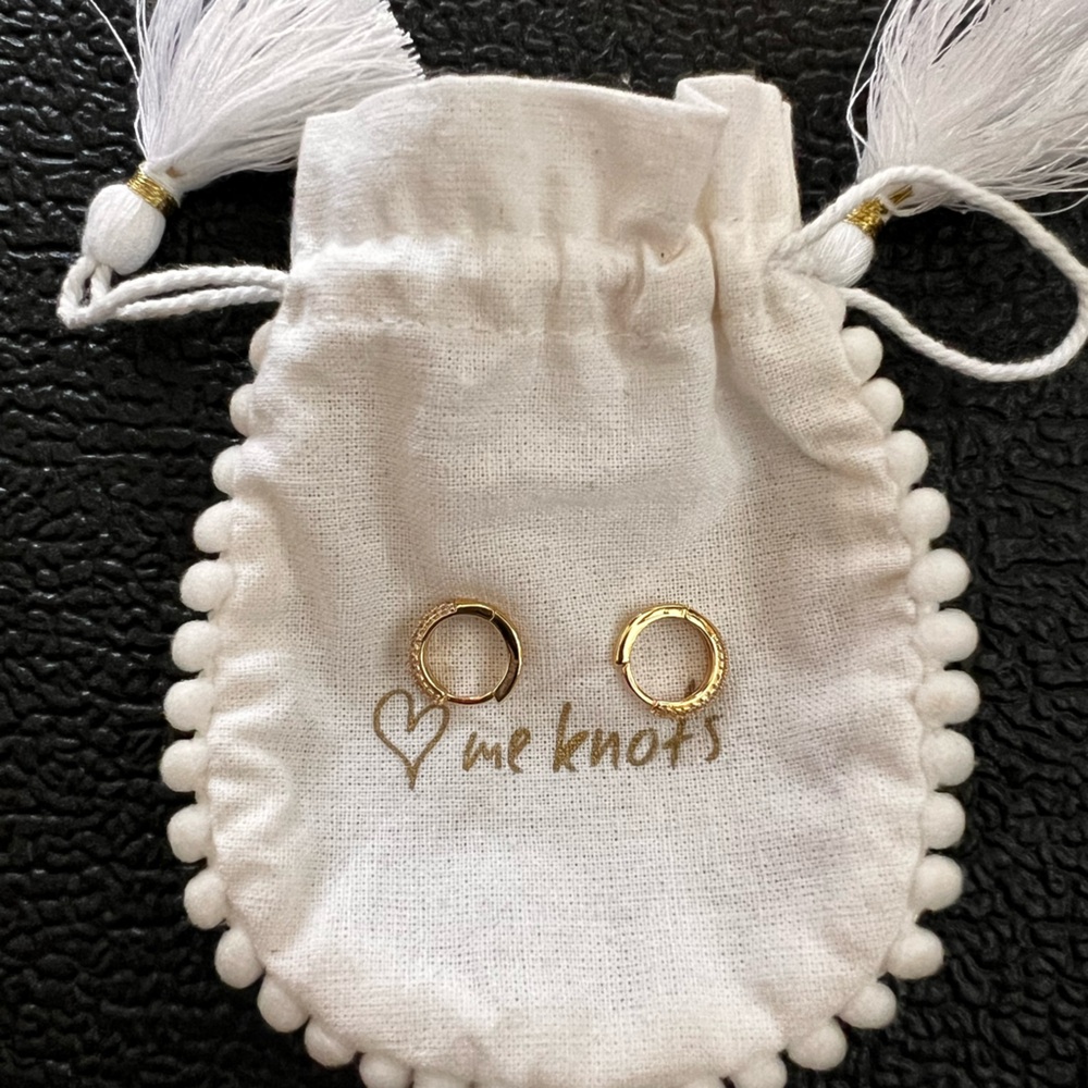 Love me knot pave Huggies earrings yellow gold